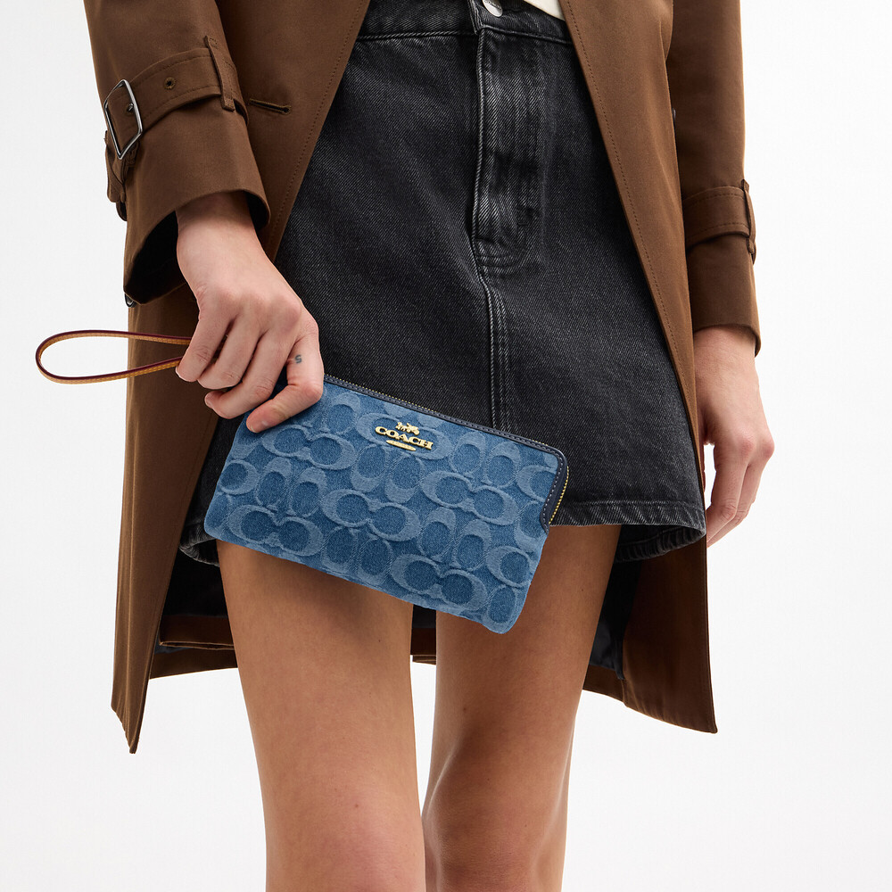 Coach Outlet Large Corner Zip Wristlet In Signature Denim